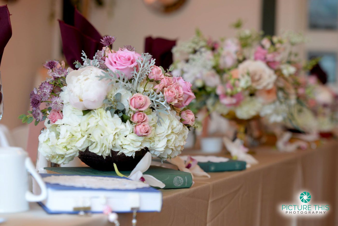 Alumni Sweethearts Wedding Details immaculate-alumni-wedding-head-table-decorations